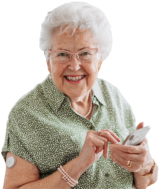 Senior, smiling woman with Continuous Glucose Monitor.